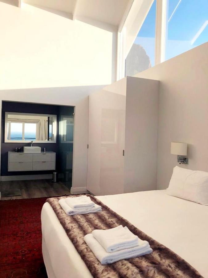 Bright Camps Bay Loft With Stunning Views And Shared Pool Appartement Kaapstad Buitenkant foto